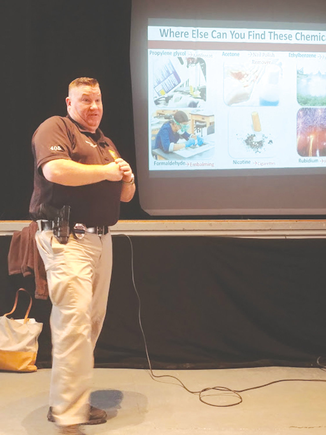 KNOWING THE DANGERS: School Resource Officer Kevin Denneny spoke to the students at Hugh B. Bain Middle School recently about the chemicals contained in e-cigarette pods.